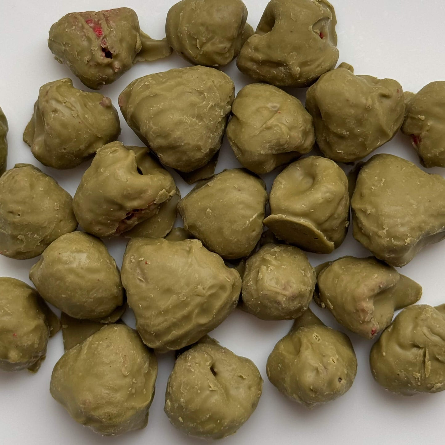 Малина у фісташковому шоколаді